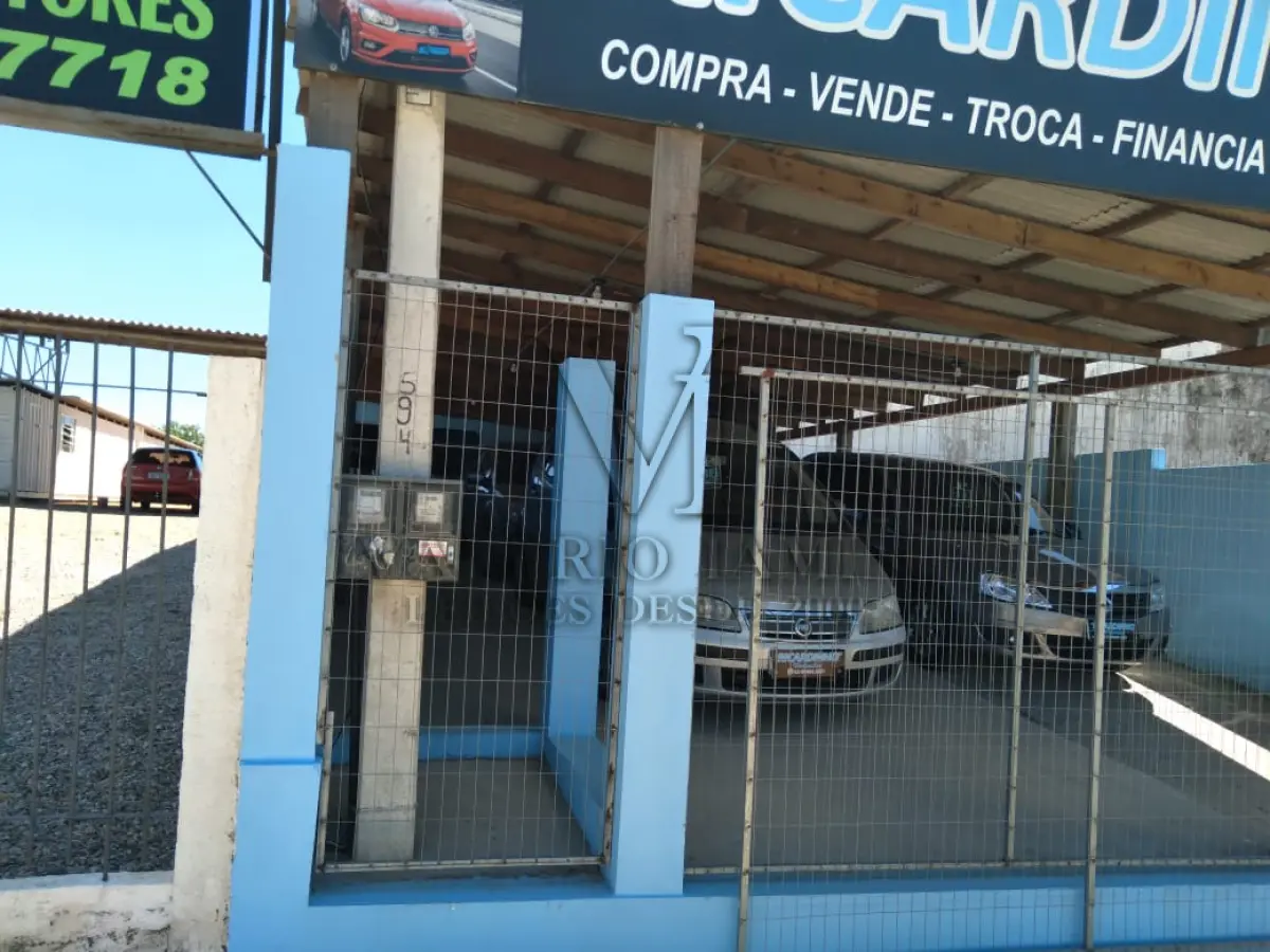 LOTE 123 - UM TERRENO E UM PRÉDIO DE ALVENÁRIA