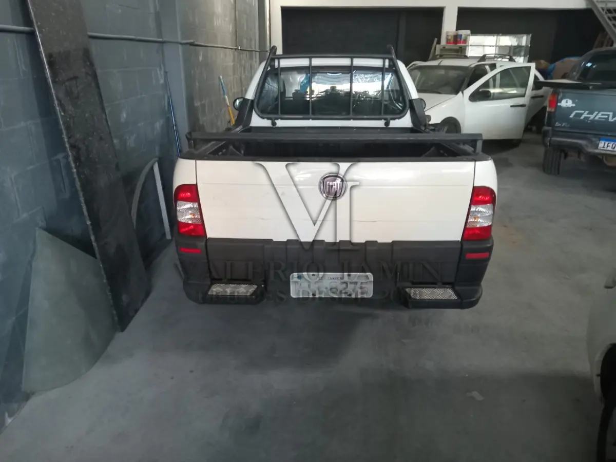 LOTE 418 - UM AUTOMOVEL FIAT/STRADA FIRE, ANO 2011, MODELO 2012