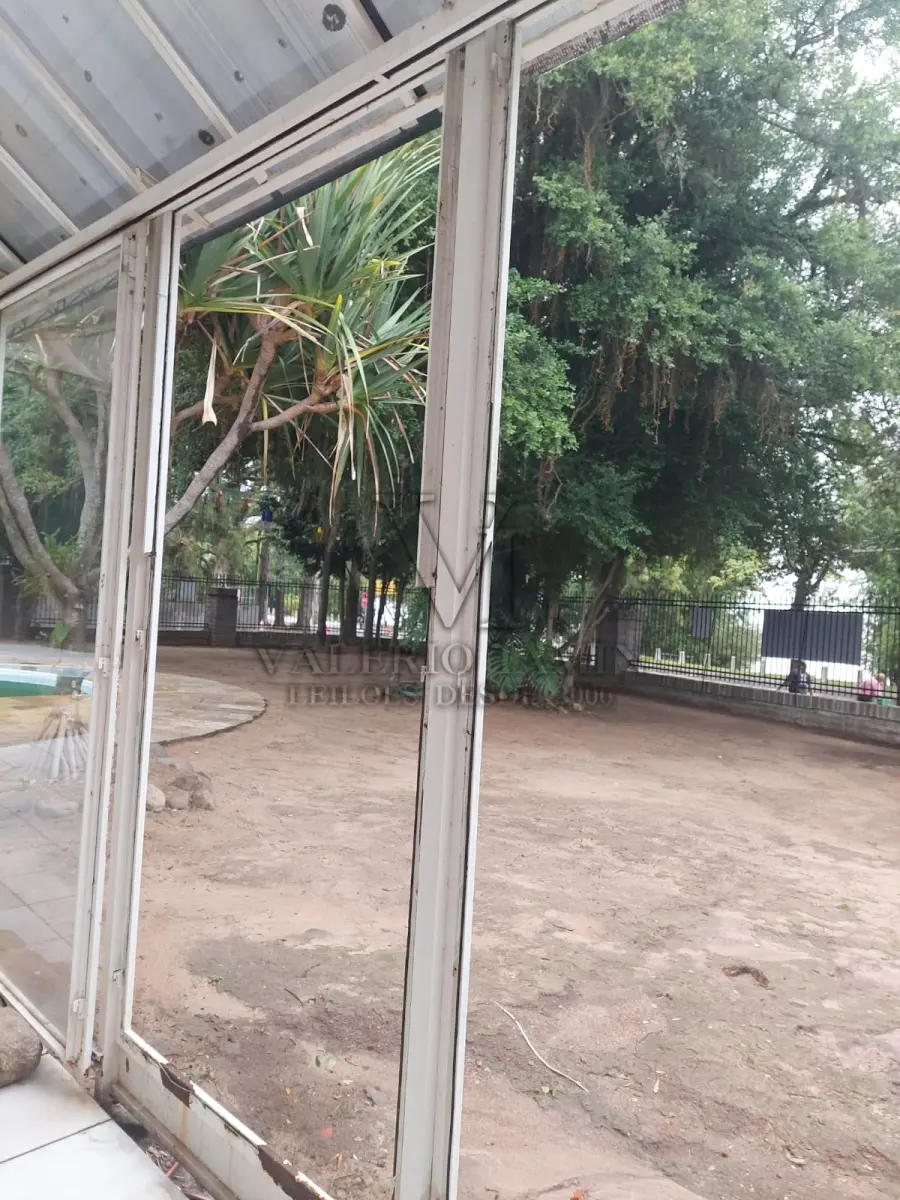 LOTE 515 - IMÓVEL – Sobrado em alvenaria localizado na Av. Guaíba nº1646 emPorto Alegre