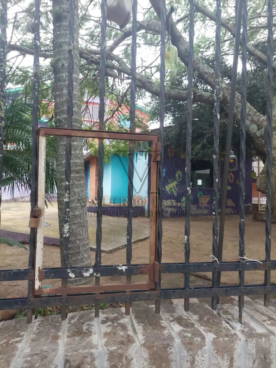 LOTE 515 - IMÓVEL – Sobrado em alvenaria localizado na Av. Guaíba nº1646 emPorto Alegre