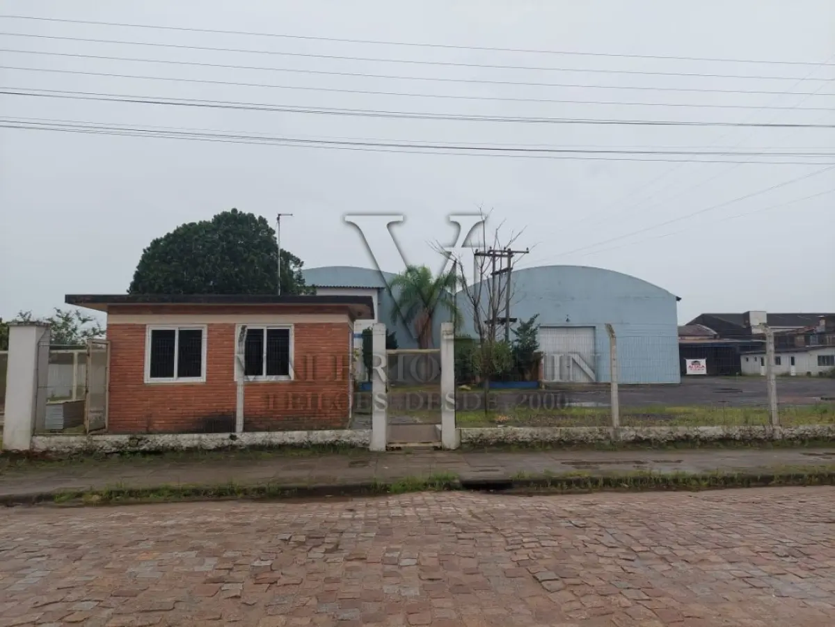 LOTE 619 - IMÓVEL: UM TERRENO EM FORMA RETANGULAR, com um prédio em Alvenaria como parte integrante do engenho e depósitos e demais prédios anexos para escritório, garagem e demais benfeitorias, com área construída de aproximadamente de 1.450,06m²