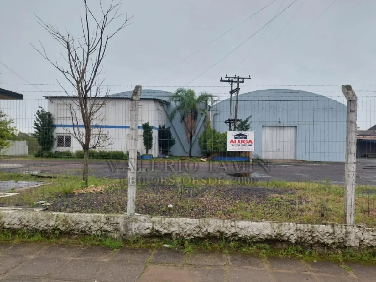 LOTE 619 - IMÓVEL: UM TERRENO EM FORMA RETANGULAR, com um prédio em Alvenaria como parte integrante do engenho e depósitos e demais prédios anexos para escritório, garagem e demais benfeitorias, com área construída de aproximadamente de 1.450,06m²