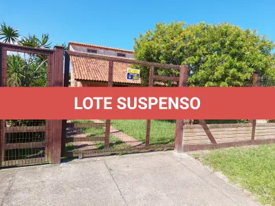 LOTE 241 - Um Imóvel e seu respectivo terreno, situado neste município, na praia de Santa Terezinha-Imbé