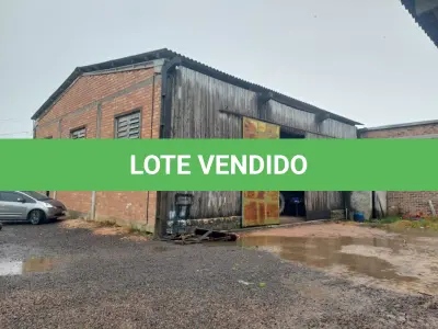 LOTE 603 - UM PAVILHÃO E SEU RESPECTIVO TERRENO URBANO