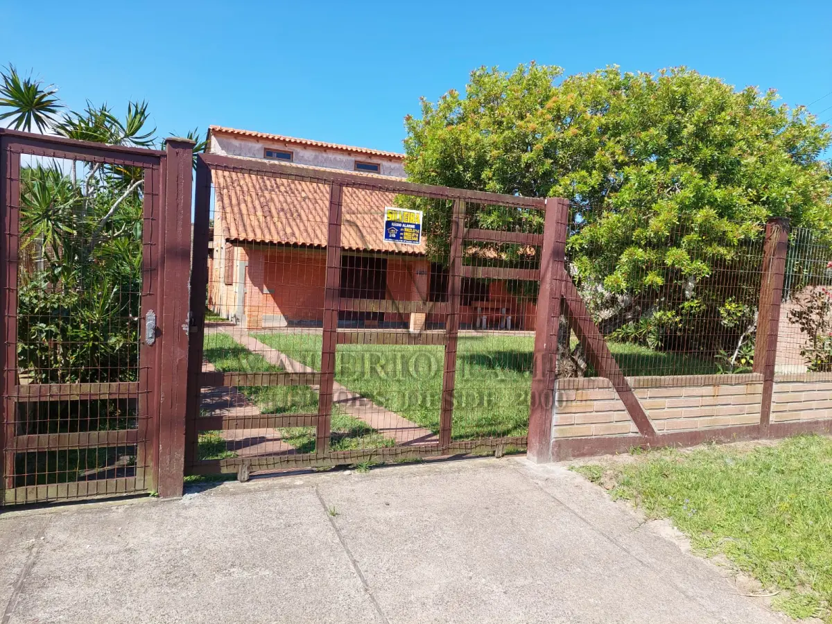 LOTE 241 - Um Imóvel e seu respectivo terreno, situado neste município, na praia de Santa Terezinha-Imbé