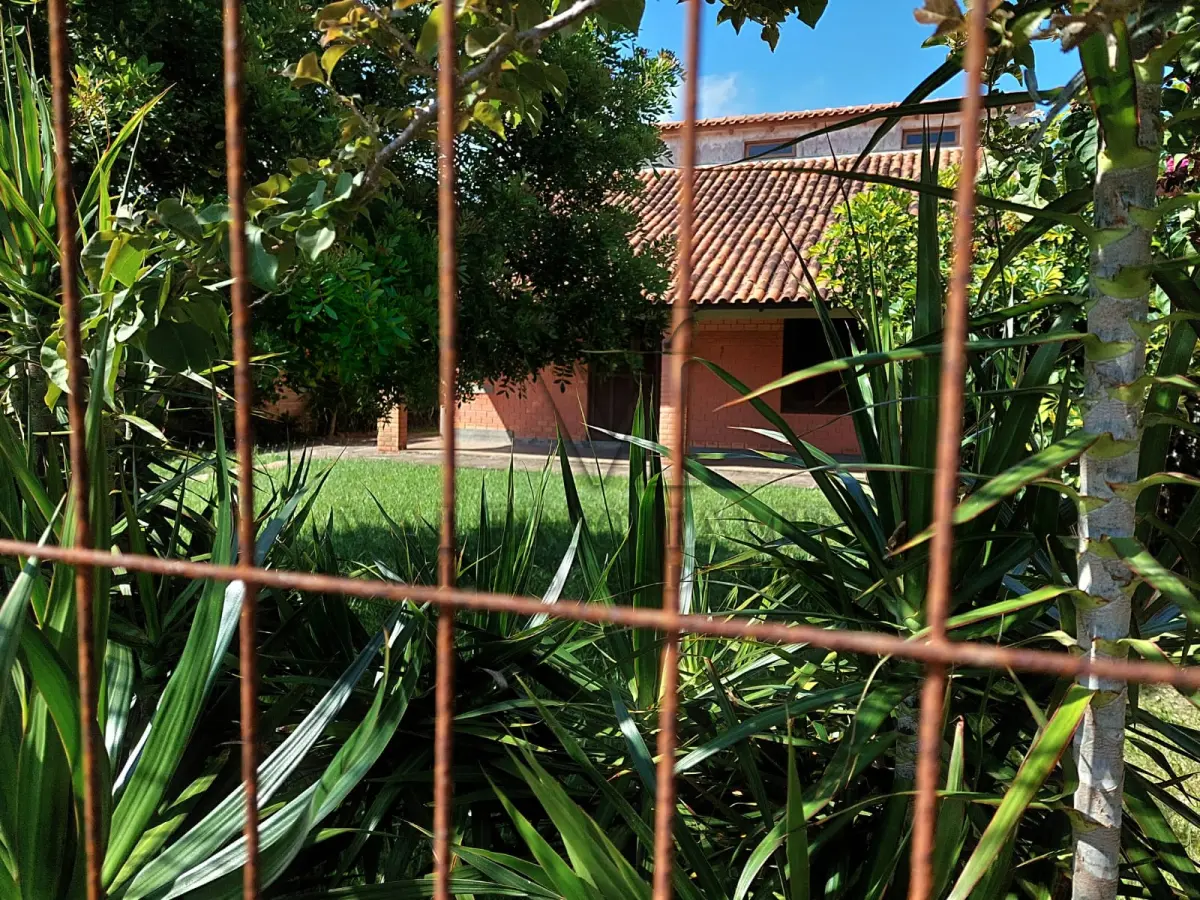 LOTE 241 - Um Imóvel e seu respectivo terreno, situado neste município, na praia de Santa Terezinha-Imbé