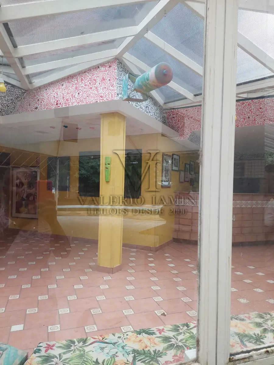 LOTE 515 - IMÓVEL – Sobrado em alvenaria localizado na Av. Guaíba nº1646 emPorto Alegre