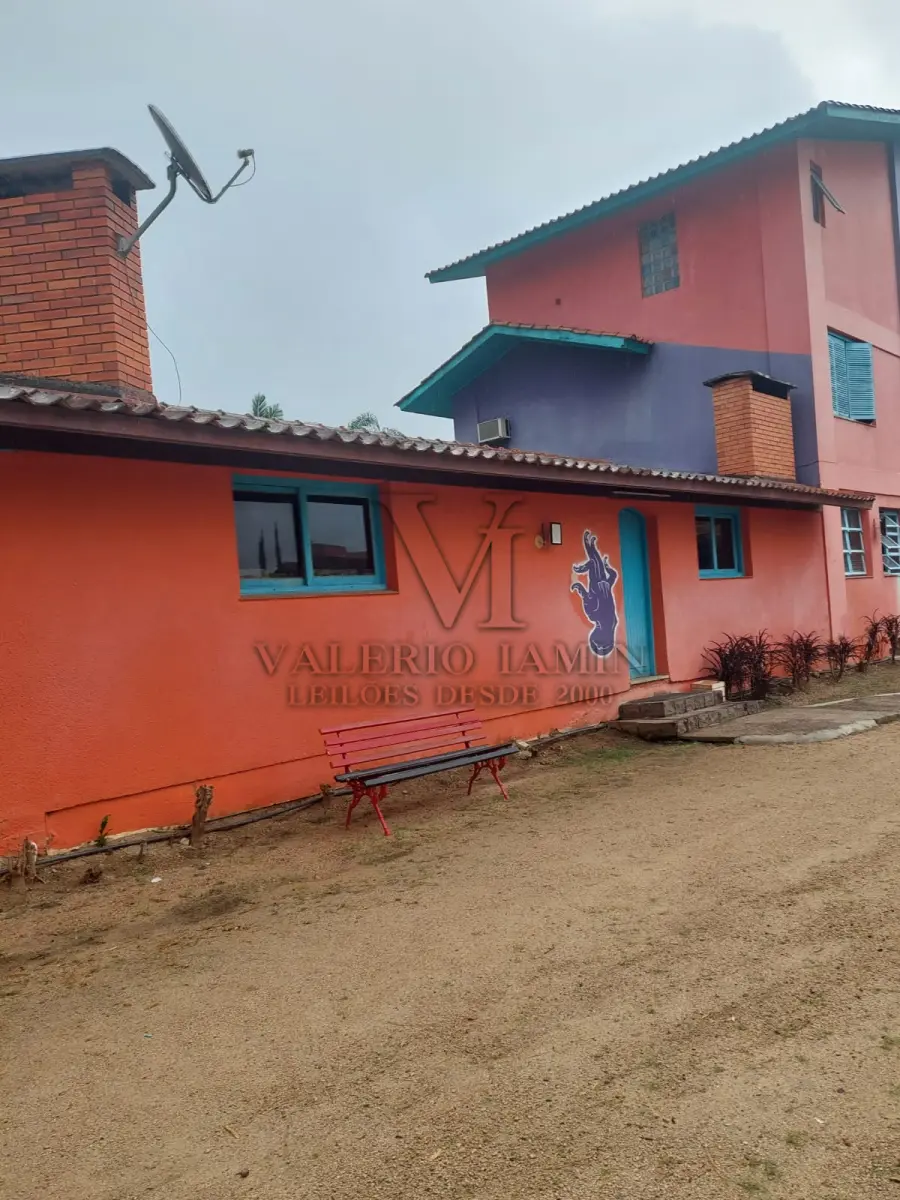 LOTE 515 - IMÓVEL – Sobrado em alvenaria localizado na Av. Guaíba nº1646 emPorto Alegre