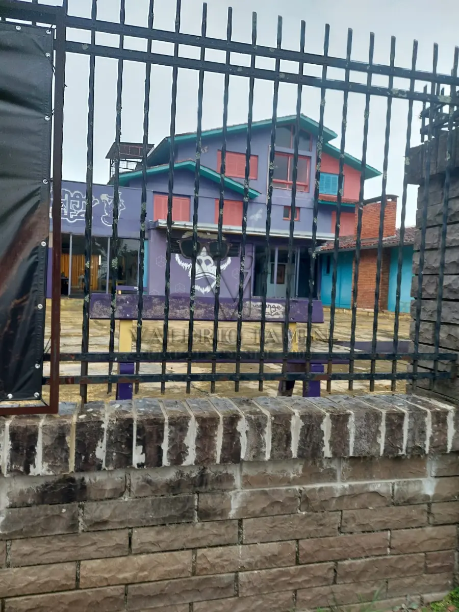 LOTE 515 - IMÓVEL – Sobrado em alvenaria localizado na Av. Guaíba nº1646 emPorto Alegre