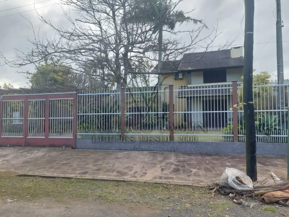 LOTE 600 - UM IMÓVEL RESIDENCIAL EM ALVENÁRIA COM AREA DE 196,77m² NA PRAIA CURUMIM EM CAPÃO DA CANOA.