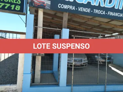 LOTE 123 - UM TERRENO E UM PRÉDIO DE ALVENÁRIA