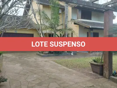 LOTE 600 - UM IMÓVEL RESIDENCIAL EM ALVENÁRIA COM AREA DE 196,77m² NA PRAIA CURUMIM EM CAPÃO DA CANOA.