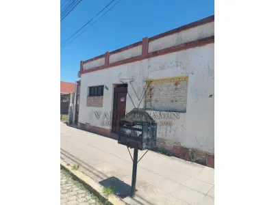 LOTE 456 - TERRENO com área superficial de 395,78m², situado na zona urbana desta cidade de Tapes/RS