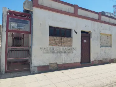 LOTE 456 - TERRENO com área superficial de 395,78m², situado na zona urbana desta cidade de Tapes/RS