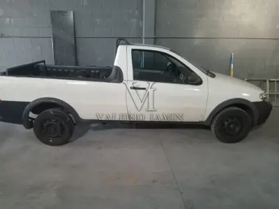 LOTE 418 - UM AUTOMOVEL FIAT/STRADA FIRE, ANO 2011, MODELO 2012