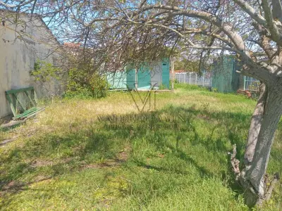 LOTE 587 - UMA CASA E SEU RESPECTIVO TERRENO URBANO, situado no Balneário Magistério