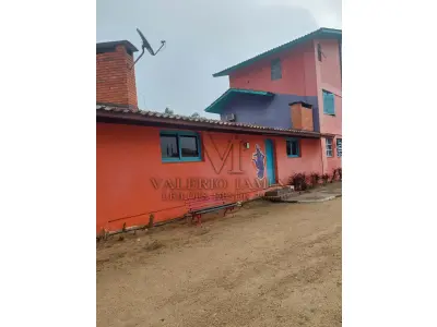 LOTE 515 - IMÓVEL – Sobrado em alvenaria localizado na Av. Guaíba nº1646 emPorto Alegre