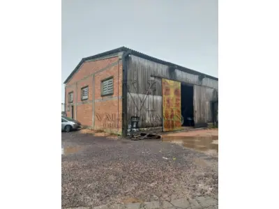 LOTE 603 - UM PAVILHÃO E SEU RESPECTIVO TERRENO URBANO