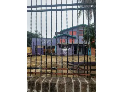 LOTE 515 - IMÓVEL – Sobrado em alvenaria localizado na Av. Guaíba nº1646 emPorto Alegre