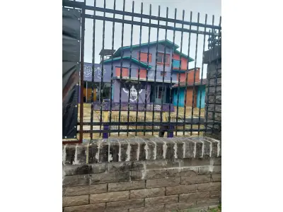 LOTE 515 - IMÓVEL – Sobrado em alvenaria localizado na Av. Guaíba nº1646 emPorto Alegre