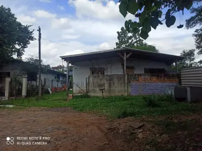 Lote 000 - um terreno urbano, onde possui uma casa de alvenaria com aproximadamente 51,62 metros quadrados aceita lance parcelado