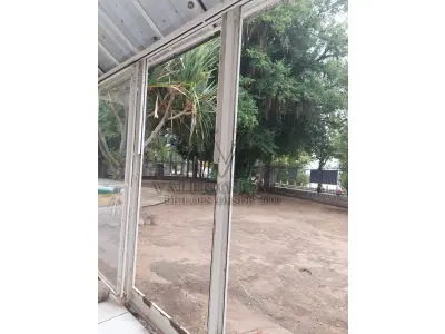 LOTE 515 - IMÓVEL – Sobrado em alvenaria localizado na Av. Guaíba nº1646 emPorto Alegre