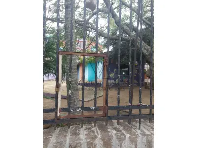 LOTE 515 - IMÓVEL – Sobrado em alvenaria localizado na Av. Guaíba nº1646 emPorto Alegre