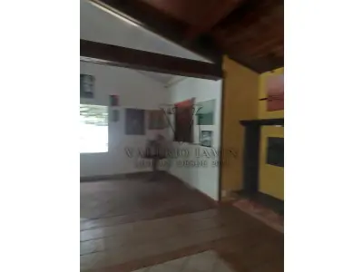 LOTE 515 - IMÓVEL – Sobrado em alvenaria localizado na Av. Guaíba nº1646 emPorto Alegre