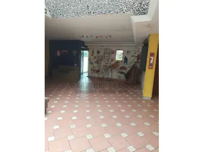 LOTE 515 - IMÓVEL – Sobrado em alvenaria localizado na Av. Guaíba nº1646 emPorto Alegre