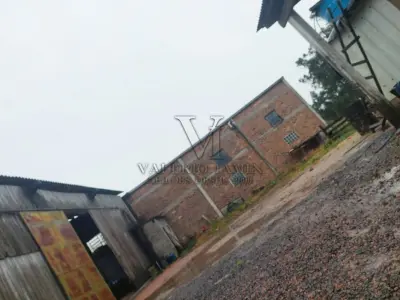 LOTE 603 - UM PAVILHÃO E SEU RESPECTIVO TERRENO URBANO