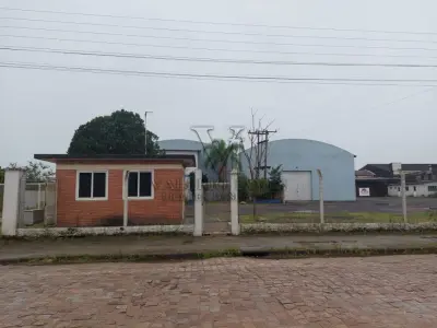 LOTE 619 - IMÓVEL: UM TERRENO EM FORMA RETANGULAR, com um prédio em Alvenaria como parte integrante do engenho e depósitos e demais prédios anexos para escritório, garagem e demais benfeitorias, com área construída de aproximadamente de 1.450,06m²