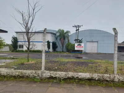 LOTE 619 - IMÓVEL: UM TERRENO EM FORMA RETANGULAR, com um prédio em Alvenaria como parte integrante do engenho e depósitos e demais prédios anexos para escritório, garagem e demais benfeitorias, com área construída de aproximadamente de 1.450,06m²
