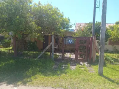 LOTE 634 - Prédio residencial  e um anexo em alvenaria e seu respectivo terreno próprio para uso residencial na rua Fernando Noronha nº2527 no Balneário Nova Tramandaí/RS