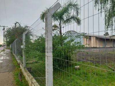 LOTE 619 - IMÓVEL: UM TERRENO EM FORMA RETANGULAR, com um prédio em Alvenaria como parte integrante do engenho e depósitos e demais prédios anexos para escritório, garagem e demais benfeitorias, com área construída de aproximadamente de 1.450,06m²
