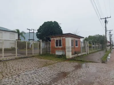 LOTE 619 - IMÓVEL: UM TERRENO EM FORMA RETANGULAR, com um prédio em Alvenaria como parte integrante do engenho e depósitos e demais prédios anexos para escritório, garagem e demais benfeitorias, com área construída de aproximadamente de 1.450,06m²