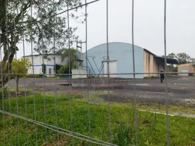 LOTE 619 - IMÓVEL: UM TERRENO EM FORMA RETANGULAR, com um prédio em Alvenaria como parte integrante do engenho e depósitos e demais prédios anexos para escritório, garagem e demais benfeitorias, com área construída de aproximadamente de 1.450,06m²