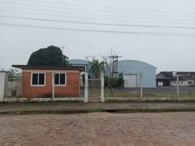 LOTE 619 - IMÓVEL: UM TERRENO EM FORMA RETANGULAR, com um prédio em Alvenaria como parte integrante do engenho e depósitos e demais prédios anexos para escritório, garagem e demais benfeitorias, com área construída de aproximadamente de 1.450,06m²