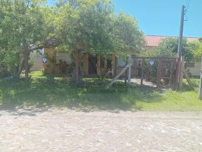 LOTE 634 - Prédio residencial  e um anexo em alvenaria e seu respectivo terreno próprio para uso residencial na rua Fernando Noronha nº2527 no Balneário Nova Tramandaí/RS