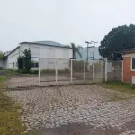 LOTE 619 - IMÓVEL: UM TERRENO EM FORMA RETANGULAR, com um prédio em Alvenaria como parte integrante do engenho e depósitos e demais prédios anexos para escritório, garagem e demais benfeitorias, com área construída de aproximadamente de 1.450,06m²