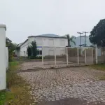 LOTE 619 - IMÓVEL: UM TERRENO EM FORMA RETANGULAR, com um prédio em Alvenaria como parte integrante do engenho e depósitos e demais prédios anexos para escritório, garagem e demais benfeitorias, com área construída de aproximadamente de 1.450,06m²