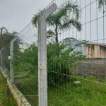 LOTE 619 - IMÓVEL: UM TERRENO EM FORMA RETANGULAR, com um prédio em Alvenaria como parte integrante do engenho e depósitos e demais prédios anexos para escritório, garagem e demais benfeitorias, com área construída de aproximadamente de 1.450,06m²