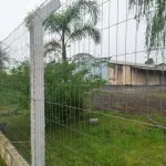 LOTE 619 - IMÓVEL: UM TERRENO EM FORMA RETANGULAR, com um prédio em Alvenaria como parte integrante do engenho e depósitos e demais prédios anexos para escritório, garagem e demais benfeitorias, com área construída de aproximadamente de 1.450,06m²