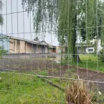 LOTE 619 - IMÓVEL: UM TERRENO EM FORMA RETANGULAR, com um prédio em Alvenaria como parte integrante do engenho e depósitos e demais prédios anexos para escritório, garagem e demais benfeitorias, com área construída de aproximadamente de 1.450,06m²